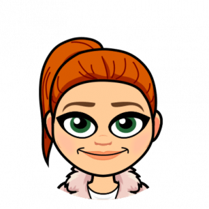 Image Description: This is a Bitmoji of Dr. Jackson. She has red hair in a high ponytail, green eyes, white skin, and is wearing a pink fluffy jacket over a white shirt.