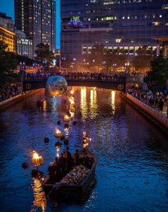 Providence Waterfire featuring a sculpture of the moon