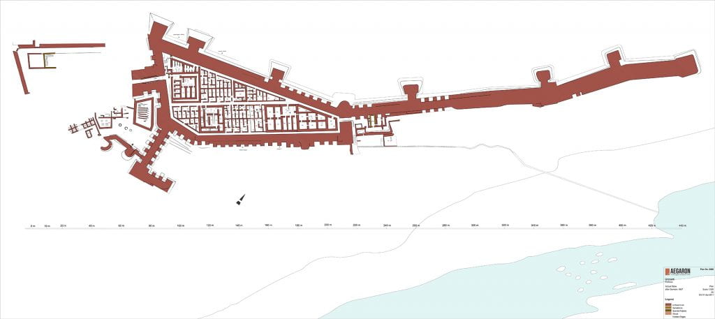 plan of the fortress with thick outer walls, smaller buildings inside, and a long spur wall to the north